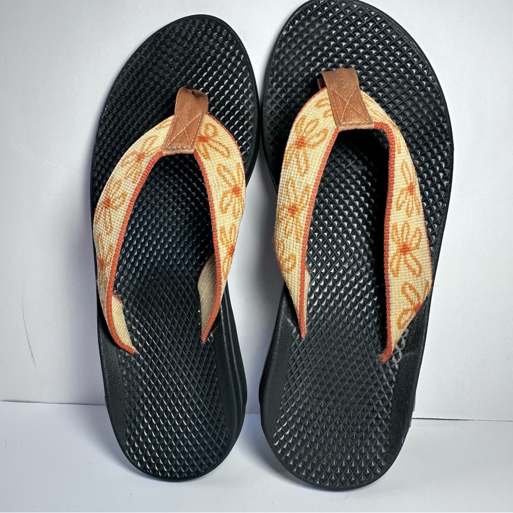 Chaco Black and Orange Floral Flip Flops Woman’s size 6